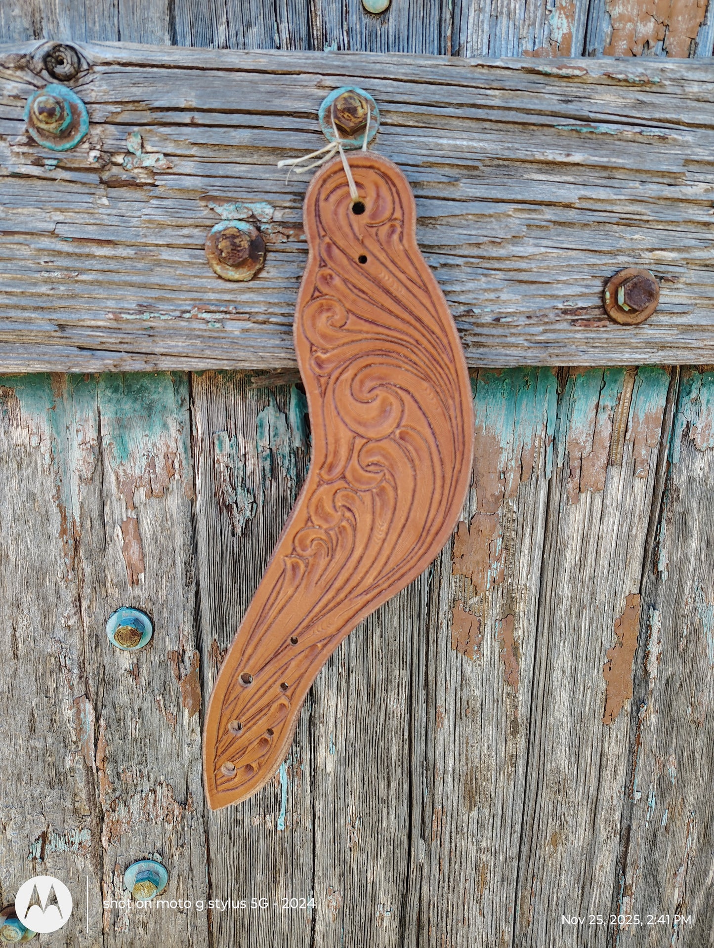 Tooled Dove wing spur straps