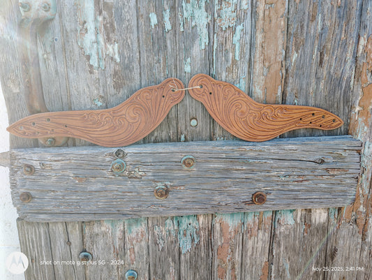 Tooled Dove wing spur straps