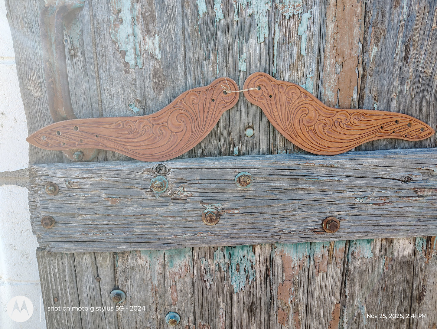 Tooled Dove wing spur straps